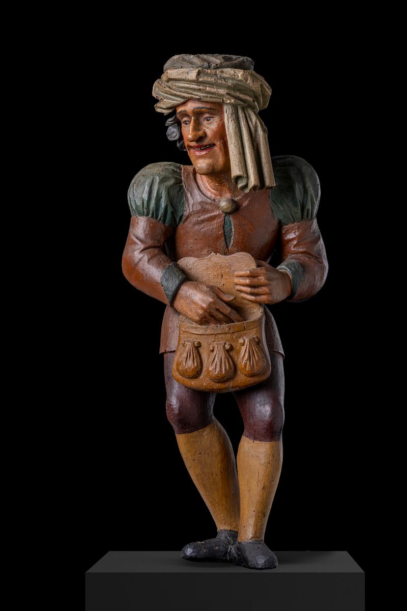 Ausstellung „UFFRUR!“: Bauer mit Geldtasche (Geldzehnt), Holzfigur aus dem Rathaussaal in Überlingen, 1534