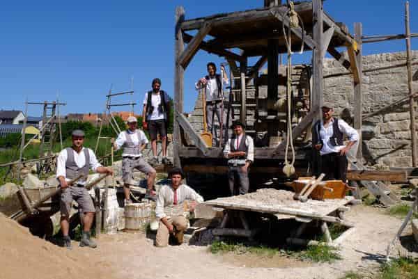 Handwerkerteam mit Wandergesellen